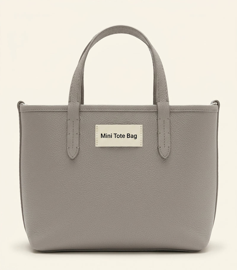 Burberry mini leather reversible Bloomsbury tote bag, imported from the UK