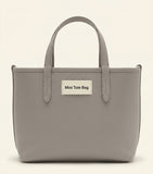 Burberry mini leather reversible Bloomsbury tote bag, imported from the UK