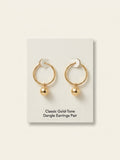 Vivienne Westwood brass heart earrings with orb charm, imported from the UK
