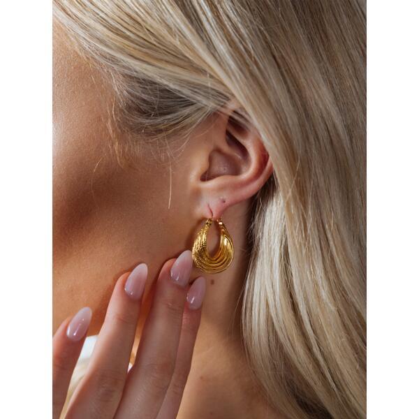SVNX gold twisted ribbed hoop earrings (British brand)