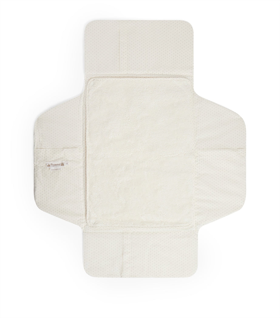 Bonpoint cotton changing mat with polka dot pattern and shearling interior, UK version