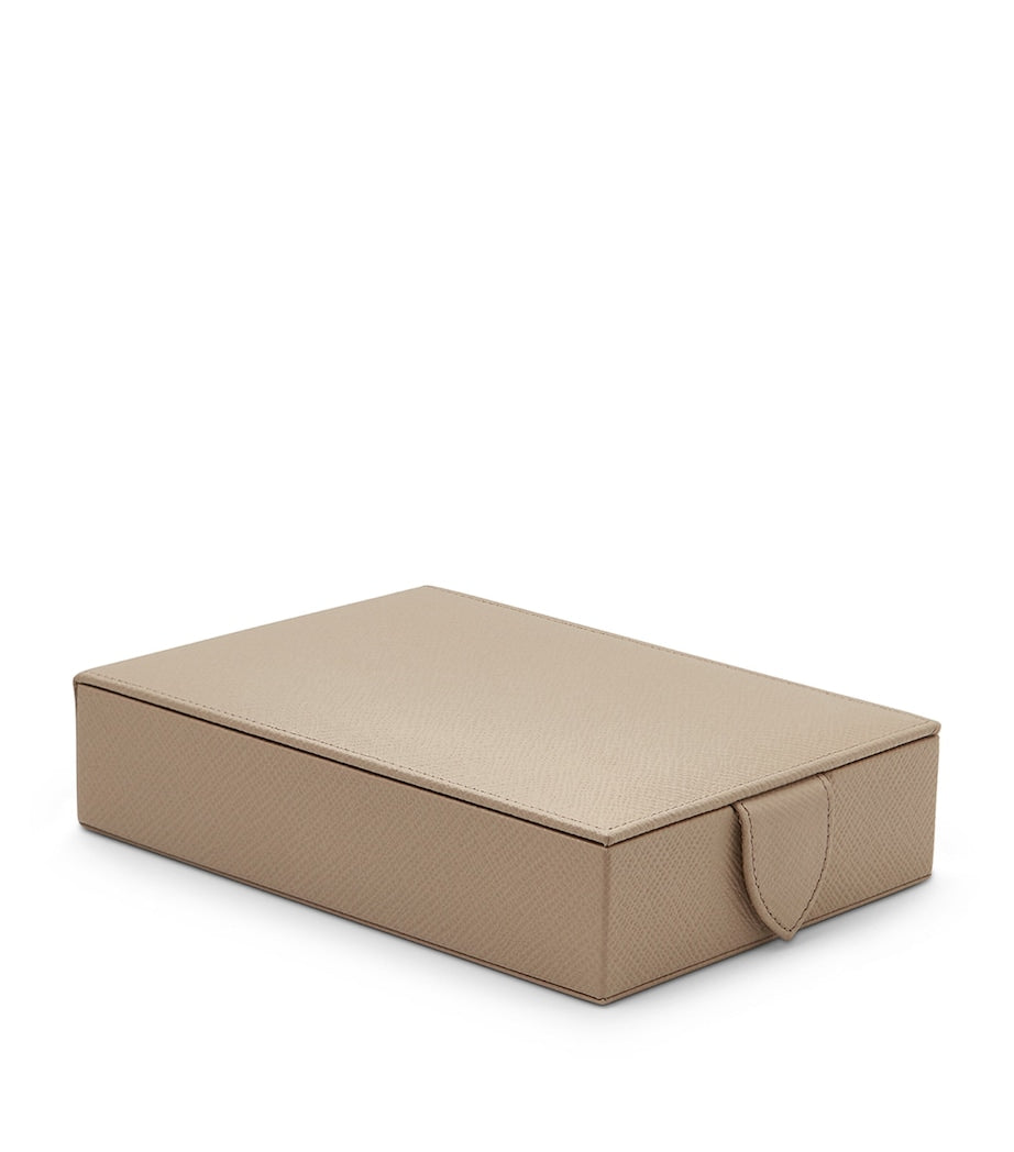 Smythson leather travel box with press-stud fastening, approximately 17x12x4cm (British brand)