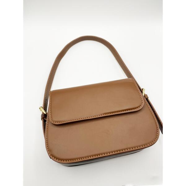 SVNX rounded crossbody bag in brown (British brand)
