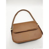 SVNX rounded crossbody bag in brown (British brand)