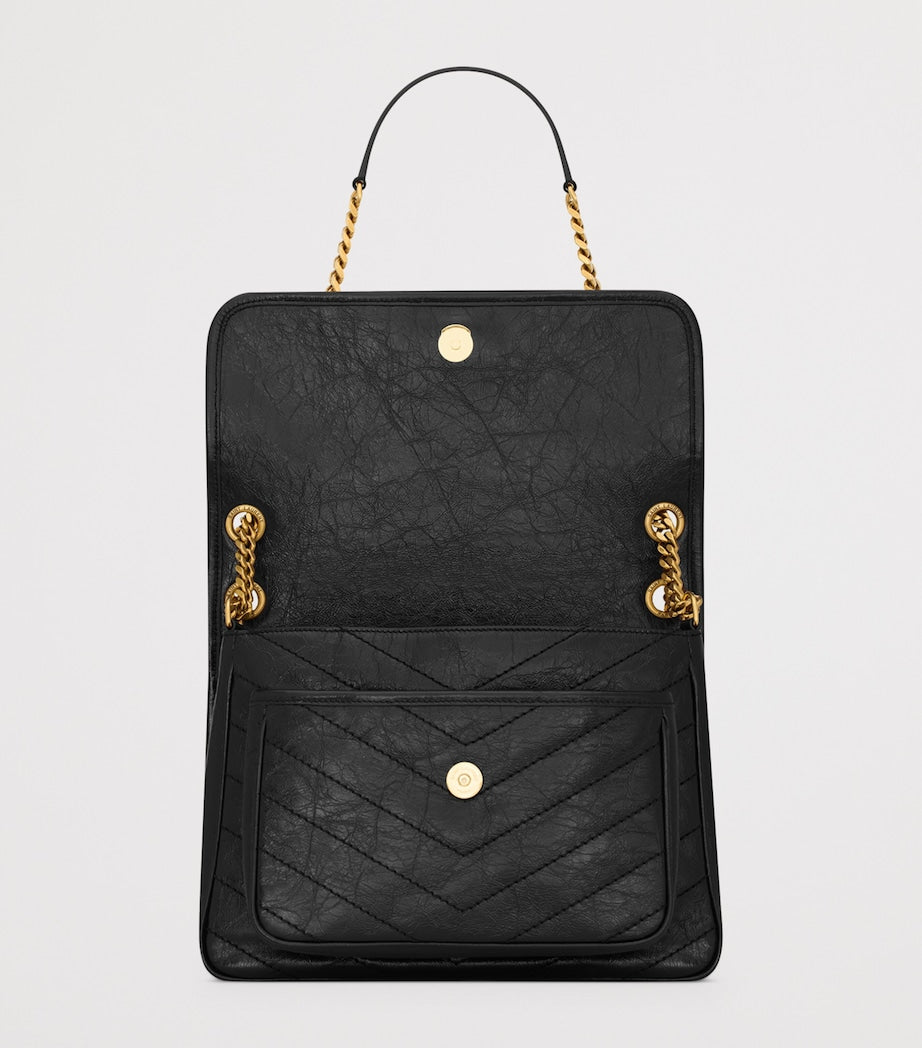 Saint Laurent Niki medium shoulder bag in textured calfskin (British brand)