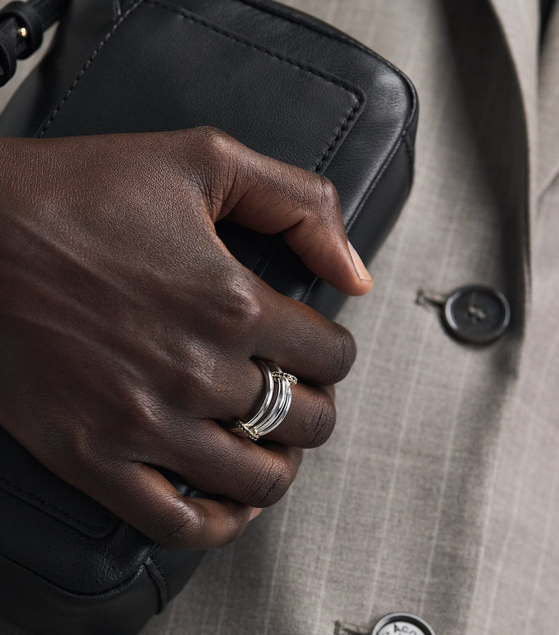 Spinelli Kilcollin Capricorn ring with black diamonds sterling silver yellow gold (British brand)