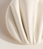 Chloé Pleats clip-on earrings, imported from the UK