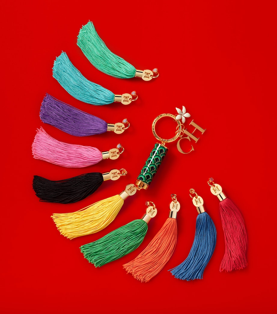 Carolina Herrera lipstick case with tassel charm - British product