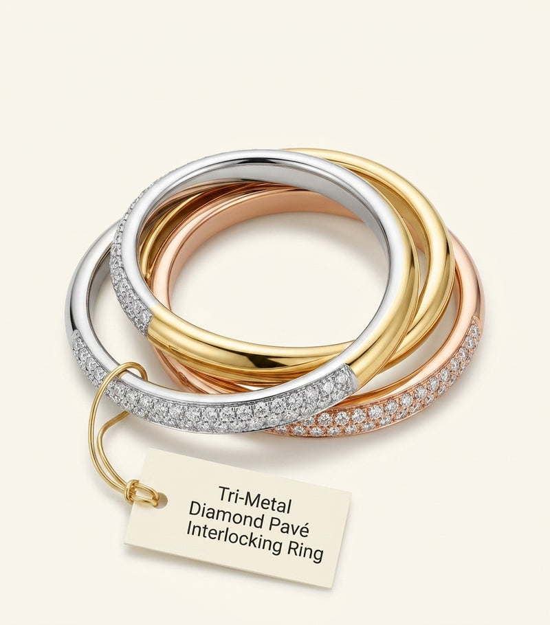 Cartier large Trinity ring with three gold bands and pavé diamonds, UK version