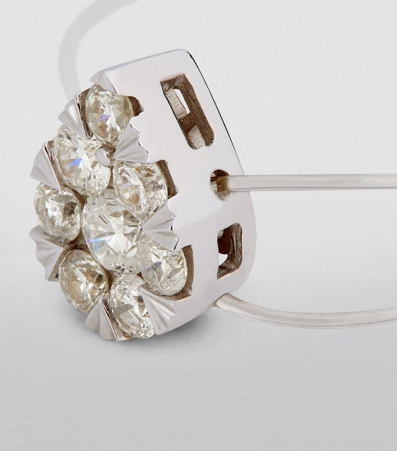 Persée white gold diamond floating ring (British brand)