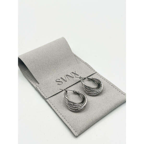 SVNX twisted ribbed hoop earrings in silver (British brand)