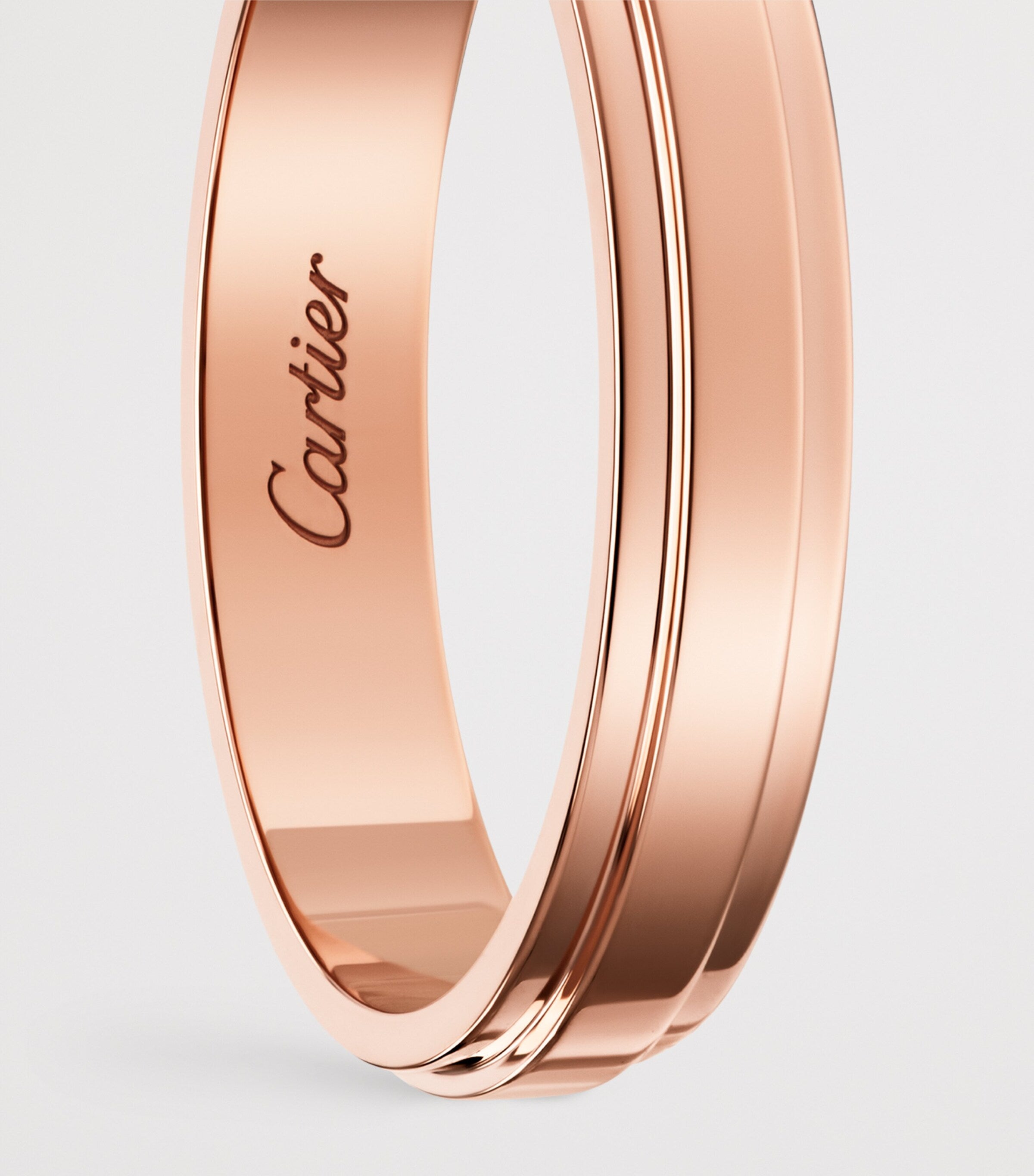 Cartier d'Amour rose gold wedding ring, imported from the UK