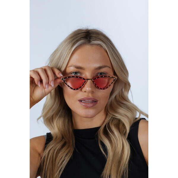SVNX pink cat-eye sunglasses with gold frame, imported from the UK