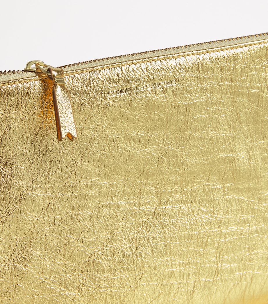 Comme des Garçons gold leather zipped pouch - British product
