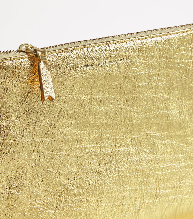 Comme des Garçons gold leather zipped pouch - British product