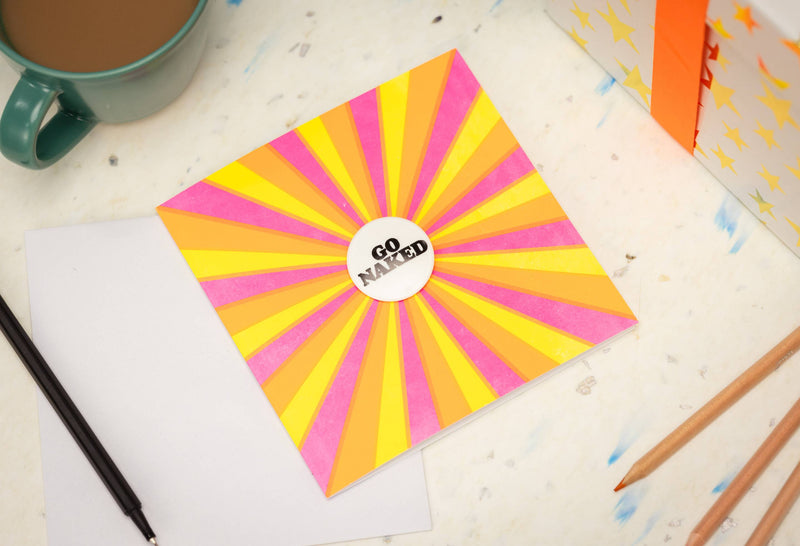 Lush Go Naked greetings card with pin badge, UK version