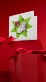 Lush HO HO HO Christmas greetings card with enamel badge (British brand)