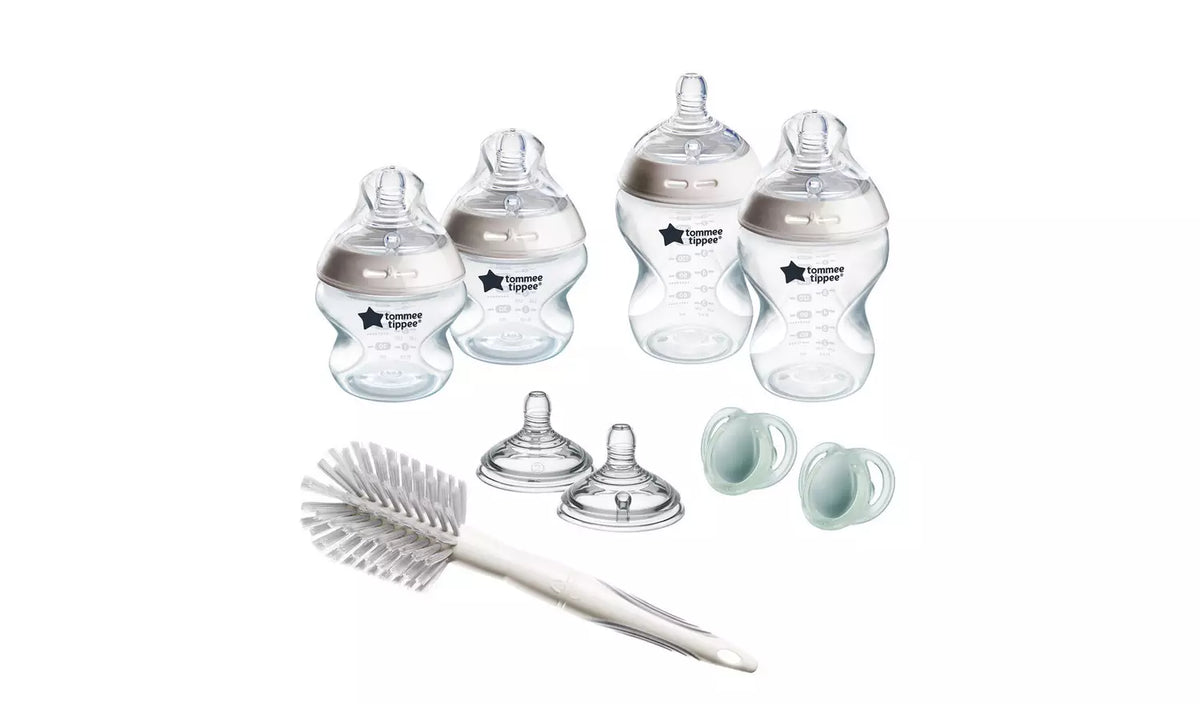 Tommee Tippee white baby bottle starter kit, imported from the UK