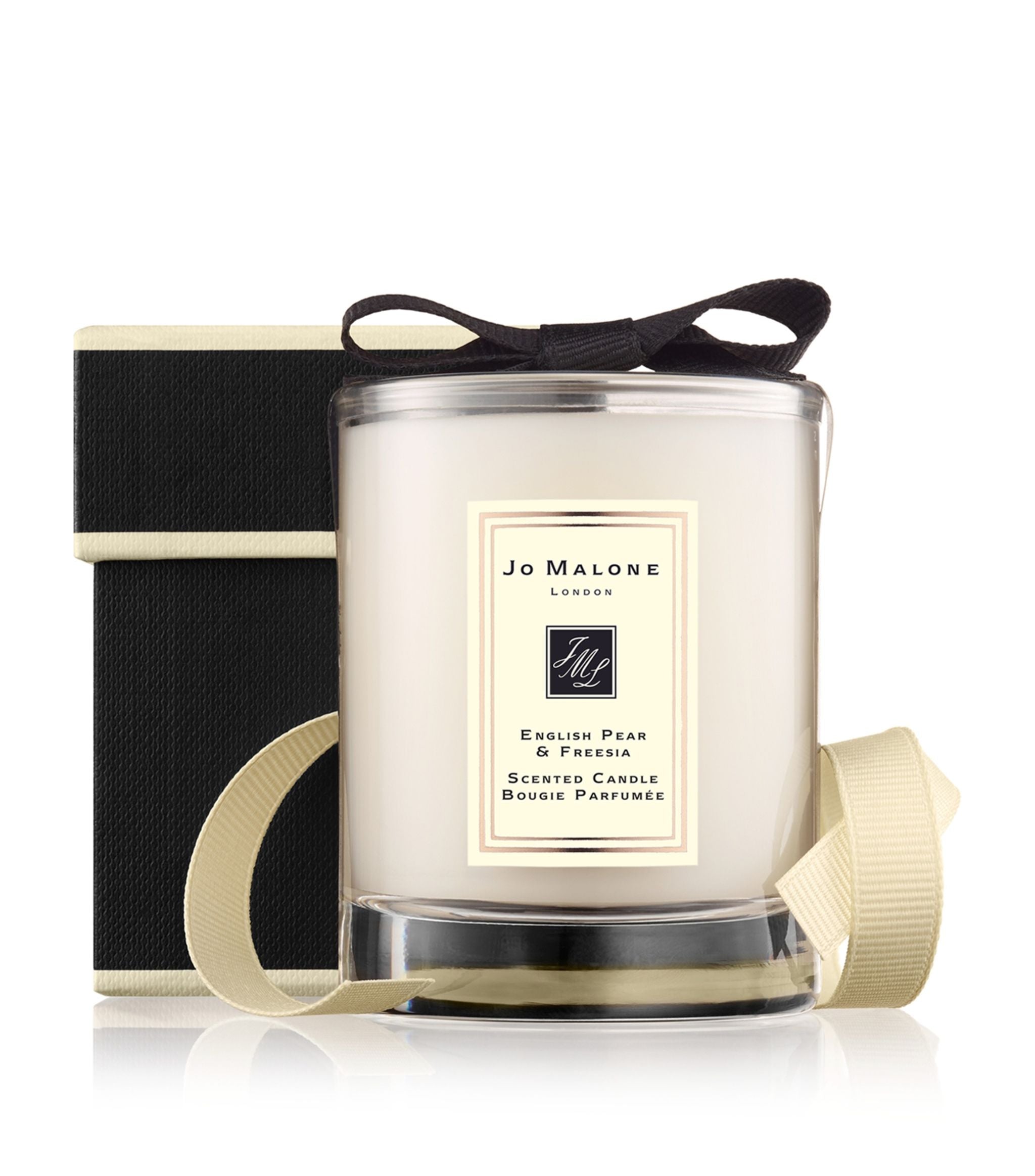 English Pear & Freesia Travel Candle (65g) GOODS Harrods   