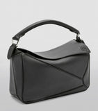 Small Leather Puzzle Top-Handle Bag GOODS Harrods   