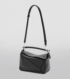 Small Leather Puzzle Top-Handle Bag GOODS Harrods   