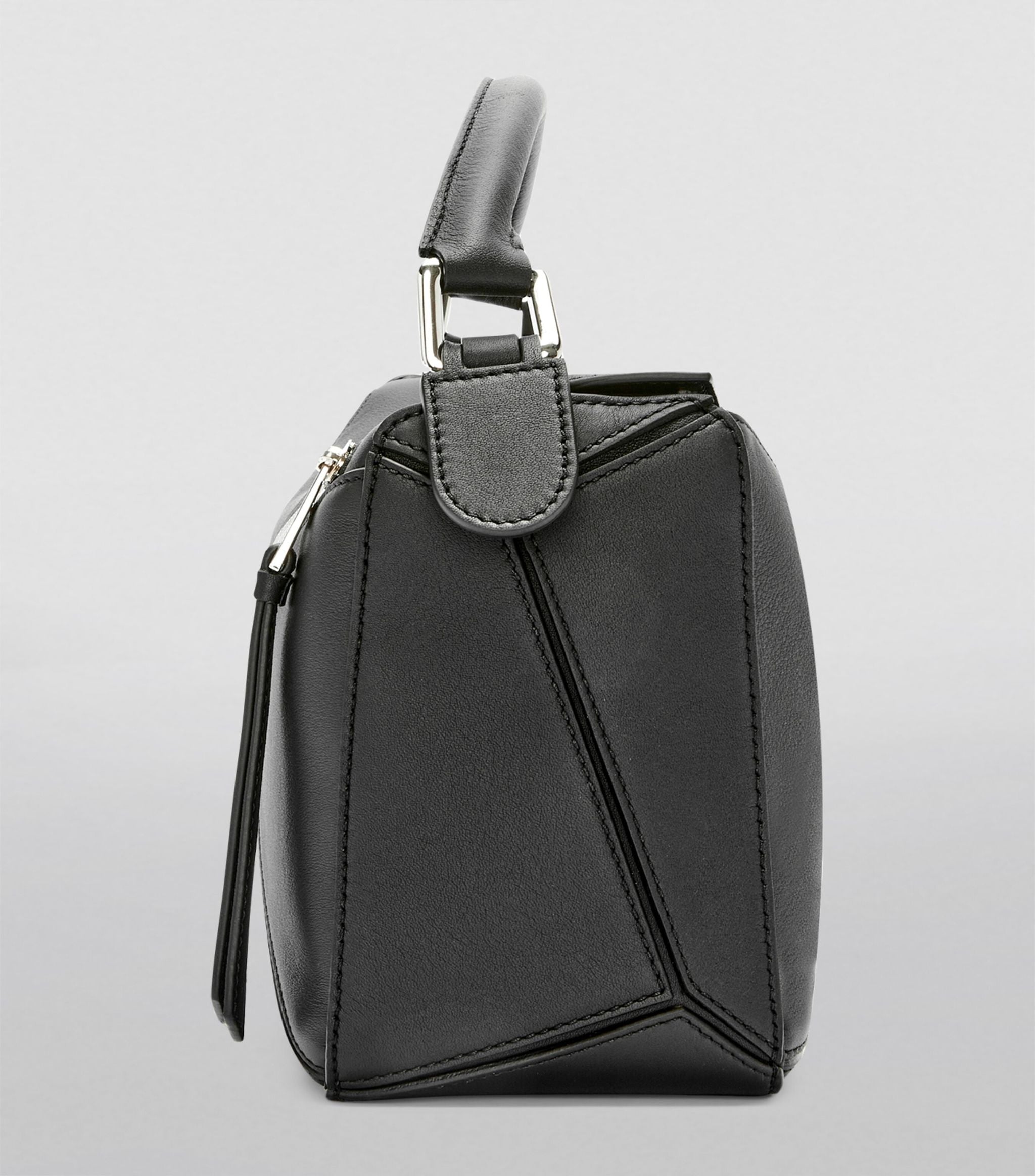 Small Leather Puzzle Top-Handle Bag GOODS Harrods   